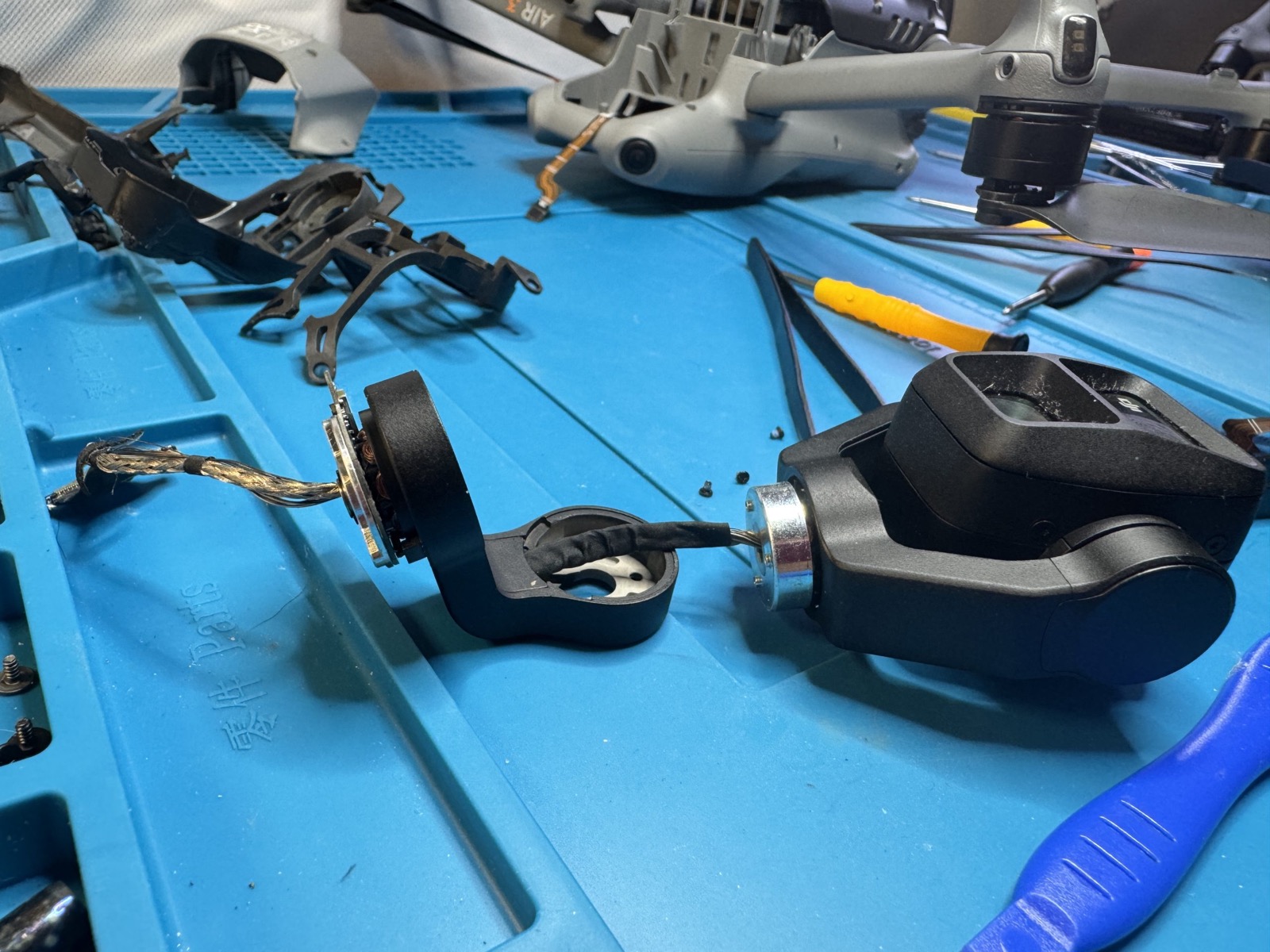 DJI gimbal and PTZ repair diagnostics on the DroneEverything repair bench